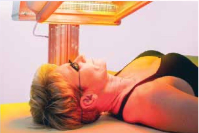 Patient wearing protective glasses during a Collagentex session