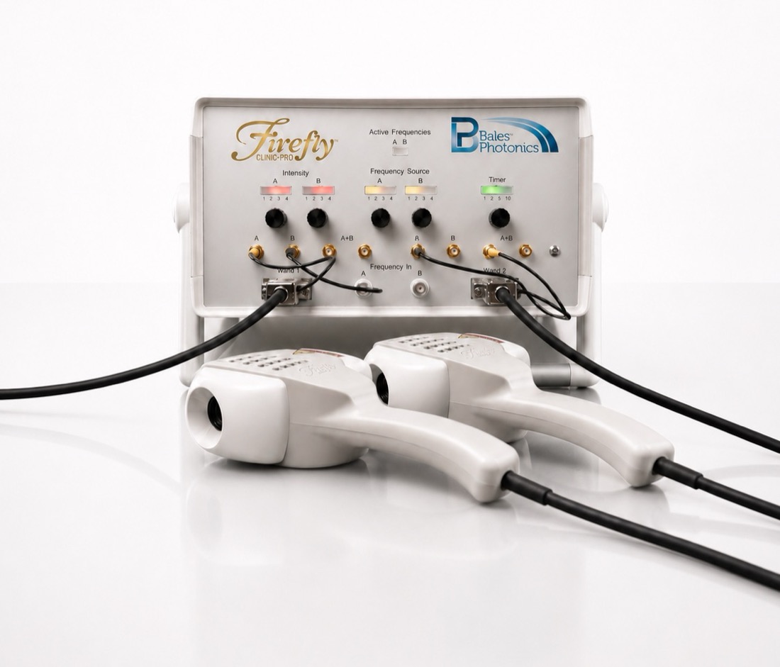 Firefly Clinic Pro console with two treatment wands